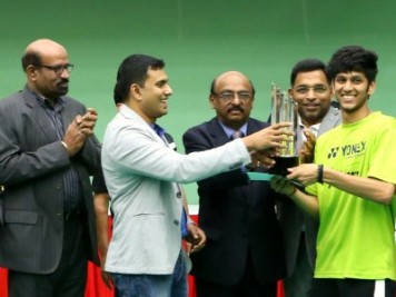 harshit-agarwal-receiving-trophy-of-isc-badminton-ePathram